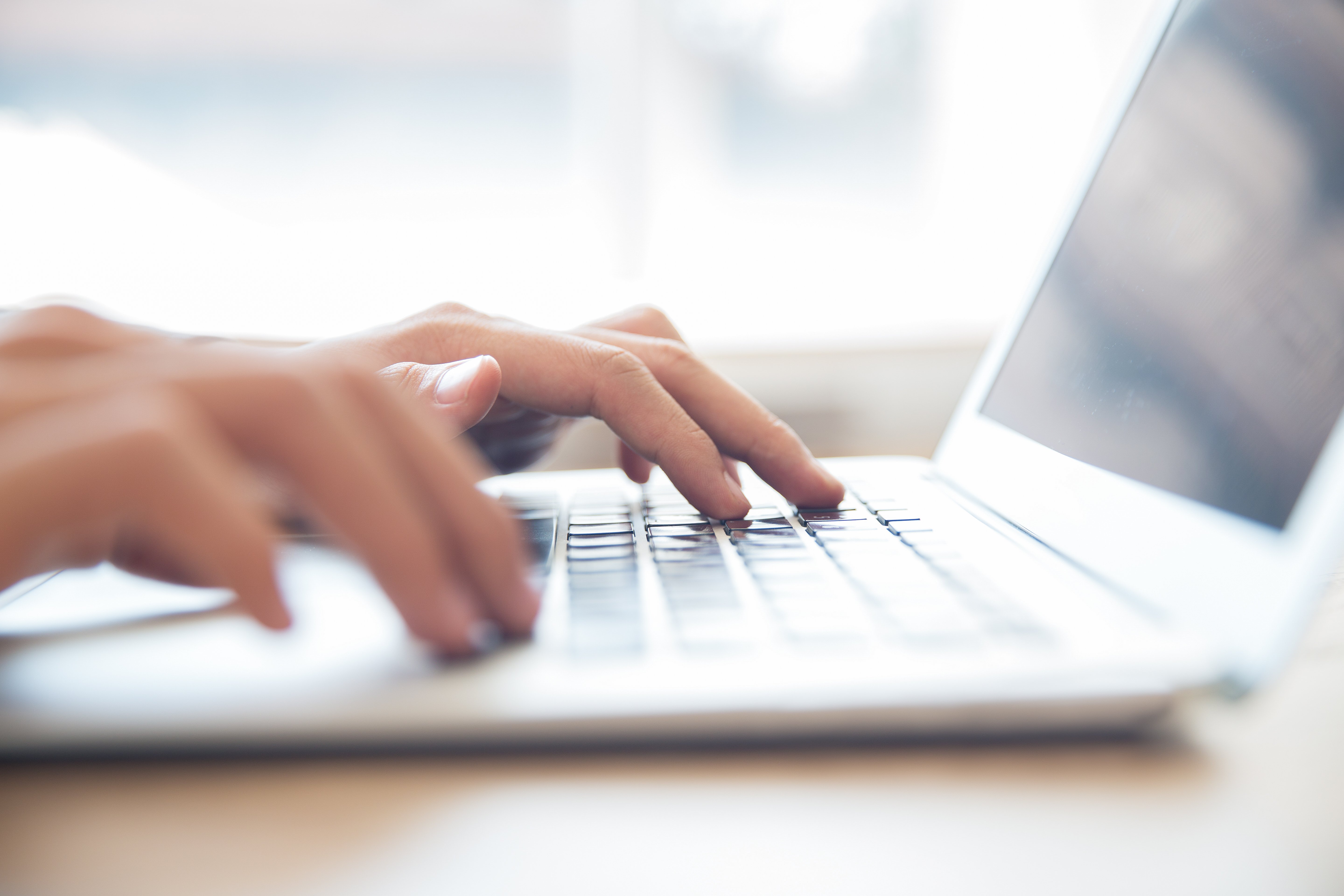 close-up-male-hands-typing-laptop-keyboard